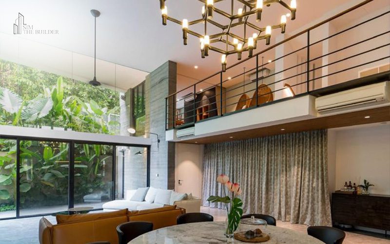 View of well-lit hallway and living room